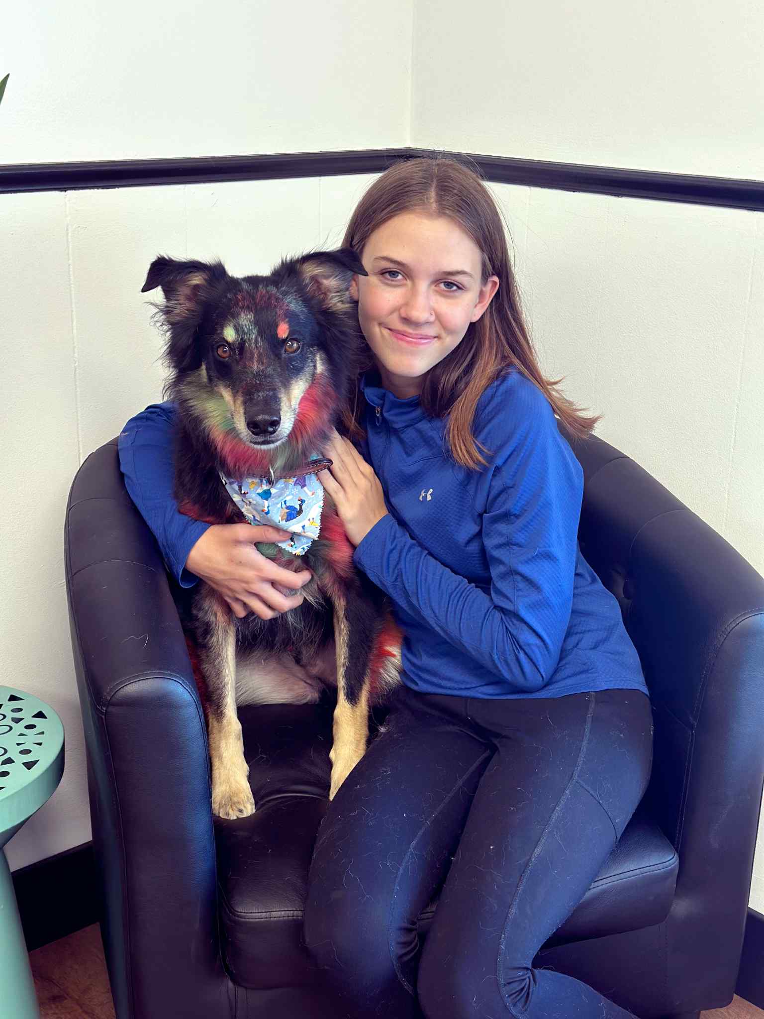 Jaedyn with her dog Goose at Color Paws Dog Grooming